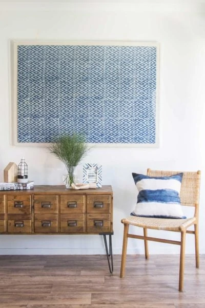 Entryway with Blues, Greens and Wood Furniture via Loomology