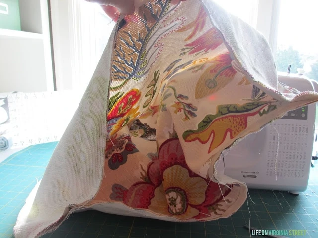 How to Make a Throw Pillow With a Zipper. This step shows flipping the fabric inside out.