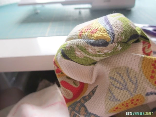 Showing the end of the pillow.